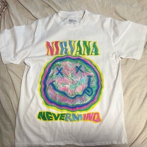 Short sleeve tee with vibrant NIRVANA graphic. Comfortable and stylish.